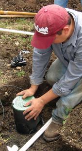 Irrigation contractor in Carlsbad, CA installs a new valve enclosure
